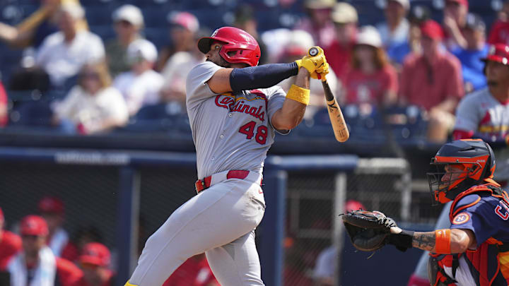 Mar 5, 2025; West Palm Beach, Florida, USA; St. Louis Cardinals catcher Ivan Herrera (48) hits a single against the Houston Astros during the third inning at CACTI Park of the Palm Beaches. Mandatory Credit: Rich Storry-Imagn Images Mar 5, 2025; West Palm Beach, Florida, USA; St. Louis Cardinals catcher Ivan Herrera (48) hits a single against the Houston Astros during the third inning at CACTI Park of the Palm Beaches. Mandatory Credit: Rich Storry-Imagn Images