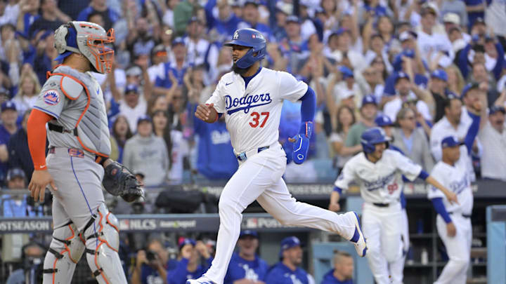Oct 20, 2024; Los Angeles, California, USA; Los Angeles Dodgers outfielder Teoscar Hernandez (37) runs home to score on a double by shortstop Tommy Edman (not pictured) in the first inning against the New York Mets during game six of the NLCS for the 2024 MLB playoffs at Dodger Stadium. Mandatory Credit: Jayne Kamin-Oncea-Imagn Images