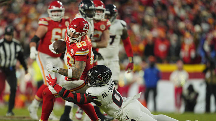 Jan 18, 2025; Kansas City, Missouri, USA; Kansas City Chiefs tight end Noah Gray (83) is tackled by Houston Texans linebacker Azeez Al-Shaair (0) during the third quarter of a 2025 AFC divisional round game at GEHA Field at Arrowhead Stadium. Mandatory Credit: Jay Biggerstaff-Imagn Images Jan 18, 2025; Kansas City, Missouri, USA; Kansas City Chiefs tight end Noah Gray (83) is tackled by Houston Texans linebacker Azeez Al-Shaair (0) during the third quarter of a 2025 AFC divisional round game at GEHA Field at Arrowhead Stadium. Mandatory Credit: Jay Biggerstaff-Imagn Images