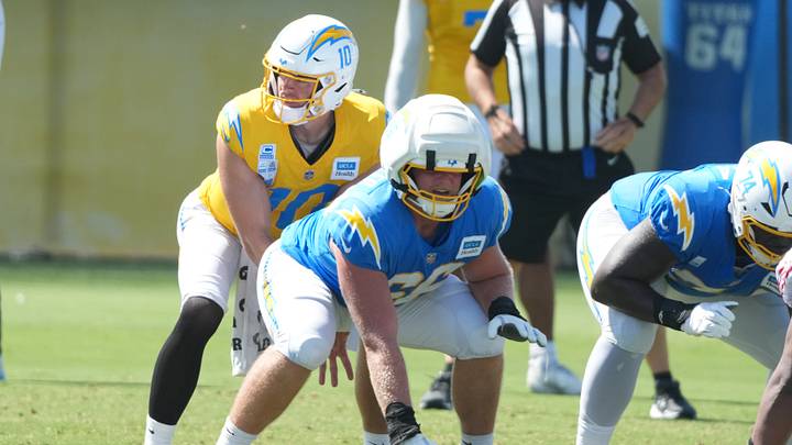 Aug 18, 2026; El Segundo, CA, USA; Los Angeles Chargers quarterback Justin Herbert (10) takes the snap from rookie center Jake Slaughter (66) during joint practice against the San Francisco 49ers at The Bolt. Mandatory Credit: Kirby Lee-Imagn Images Aug 18, 2026; El Segundo, CA, USA; Los Angeles Chargers quarterback Justin Herbert (10) takes the snap from rookie center Jake Slaughter (66) during joint practice against the San Francisco 49ers at The Bolt. Mandatory Credit: Kirby Lee-Imagn Images