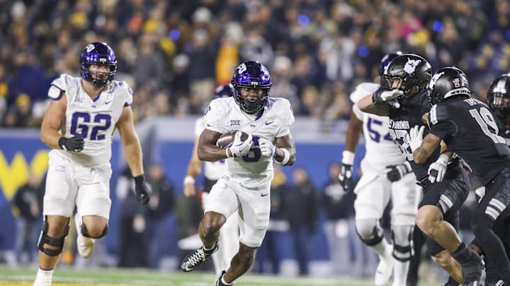 Oct 25, 2025; Morgantown, West Virginia, USA; Texas Christian University Horned Frogs running back Trent Battle (6) runs the ball during the third quarter against the West Virginia Mountaineers at Milan Puskar Stadium. Mandatory Credit: Ben Queen-Imagn Images Oct 25, 2025; Morgantown, West Virginia, USA; Texas Christian University Horned Frogs running back Trent Battle (6) runs the ball during the third quarter against the West Virginia Mountaineers at Milan Puskar Stadium. Mandatory Credit: Ben Queen-Imagn Images