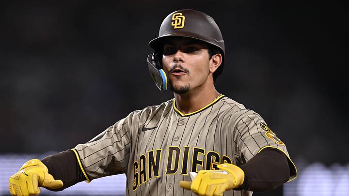 Sep 24, 2026; Los Angeles, California, USA;  San Diego Padres catcher Ethan Salas (8) gestures after hitting an RBI single during the seventh inning against the Los Angeles Dodgers at Dodger Stadium.  Mandatory Credit: William Liang-Imagn Images