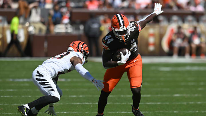 Sep 7, 2025; Cleveland, Ohio, USA; Cleveland Browns tight end Harold Fannin Jr. (44) runs after a catch against Cincinnati Bengals cornerback Dax Hill (23) during the second half at Huntington Bank Field. Mandatory Credit: Ken Blaze-Imagn Images