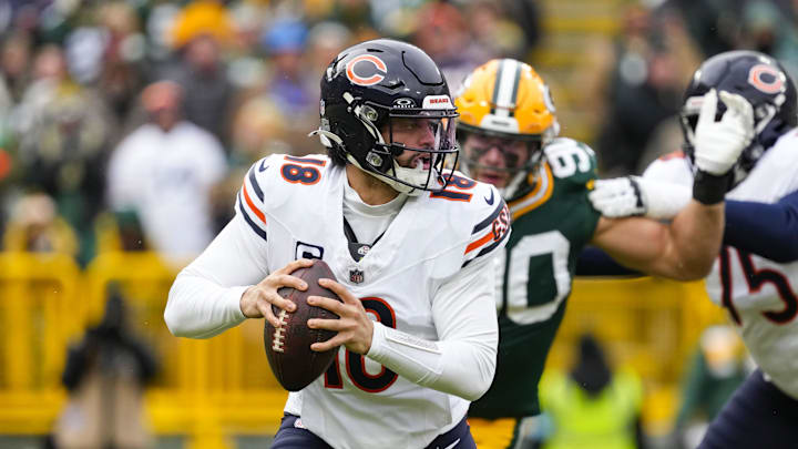 Jan 5, 2025; Green Bay, Wisconsin, USA;  Chicago Bears quarterback Caleb Williams (18) during the game against the Chicago Bears at Lambeau Field. Mandatory Credit: Jeff Hanisch-Imagn Images