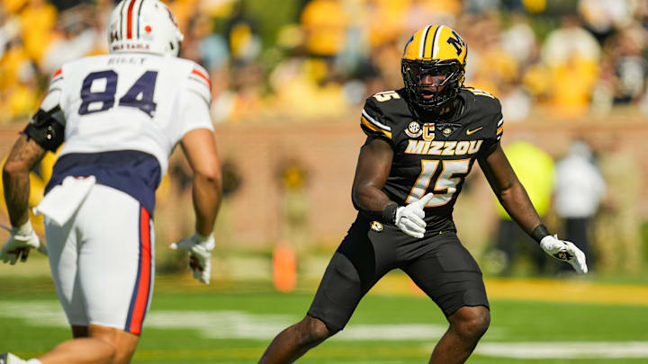 Oct 19, 2024; Columbia, Missouri, USA; Missouri Tigers defensive end Johnny Walker Jr. (15) defends Auburn Tigers tight end Micah Riley (84) during the second half at Faurot Field at Memorial Stadium. Mandatory Credit: Jay Biggerstaff-Imagn Images Oct 19, 2024; Columbia, Missouri, USA; Missouri Tigers defensive end Johnny Walker Jr. (15) defends Auburn Tigers tight end Micah Riley (84) during the second half at Faurot Field at Memorial Stadium. Mandatory Credit: Jay Biggerstaff-Imagn Images
