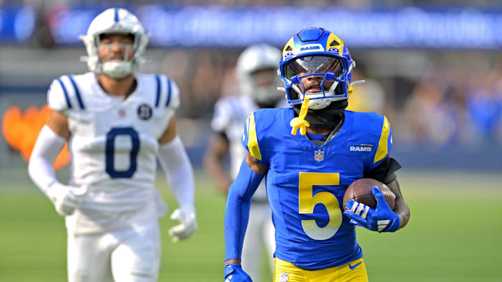 Sep 28, 2025; Inglewood, California, USA; Los Angeles Rams wide receiver Tutu Atwell (5) runs for a touchdown on an 88 yard pass play in the fourth quarter against the Indianapolis Colts at SoFi Stadium. Mandatory Credit: Jayne Kamin-Oncea-Imagn Images