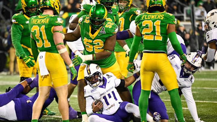 Dec 20, 2025; Eugene, OR, USA; James Madison Dukes quarterback Alonza Barnett III (14) scores a touchdown during the fourth quarter against the Oregon Ducks at Autzen Stadium. Mandatory Credit: Troy Wayrynen-Imagn Images Dec 20, 2025; Eugene, OR, USA; James Madison Dukes quarterback Alonza Barnett III (14) scores a touchdown during the fourth quarter against the Oregon Ducks at Autzen Stadium. Mandatory Credit: Troy Wayrynen-Imagn Images