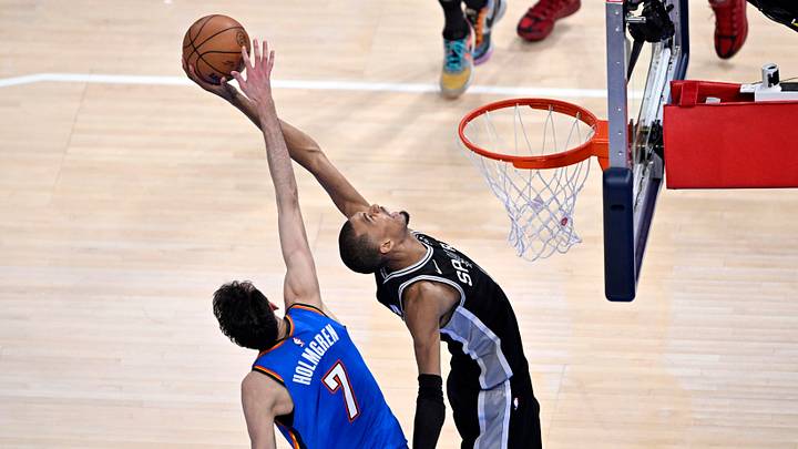 May 30, 2026; Oklahoma City, Oklahoma, USA; San Antonio Spurs forward Victor Wembanyama (1) and Oklahoma City Thunder center Chet Holmgren (7) reach for a rebound in the second quarter during game seven of the western conference finals for the 2026 NBA playoffs at Paycom Center. May 30, 2026; Oklahoma City, Oklahoma, USA; San Antonio Spurs forward Victor Wembanyama (1) and Oklahoma City Thunder center Chet Holmgren (7) reach for a rebound in the second quarter during game seven of the western conference finals for the 2026 NBA playoffs at Paycom Center.