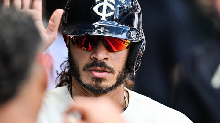 Jun 6, 2026; Minneapolis, Minnesota, USA; Minnesota Twins right fielder Austin Martin (16) reacts after scoring on a sacrifice fly against the Kansas City Royals during the fifth inning at Target Field. Mandatory Credit: Jeffrey Becker-Imagn Images