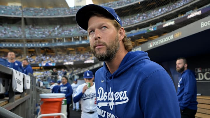 Sep 30, 2025; Los Angeles, California, USA; Los Angeles Dodgers starting pitcher Clayton Kershaw (22) in the dugout prior to game one of the Wildcard round for the 2025 MLB playoffs against the Cincinnati Reds at Dodger Stadium. Mandatory Credit: Jayne Kamin-Oncea-Imagn Images Sep 30, 2025; Los Angeles, California, USA; Los Angeles Dodgers starting pitcher Clayton Kershaw (22) in the dugout prior to game one of the Wildcard round for the 2025 MLB playoffs against the Cincinnati Reds at Dodger Stadium. Mandatory Credit: Jayne Kamin-Oncea-Imagn Images