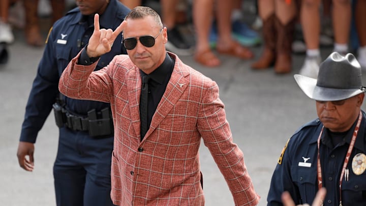 The coaching carousel dominoes hit Texas and Steve Sarkisian in our mostly unserious chain reaction. 