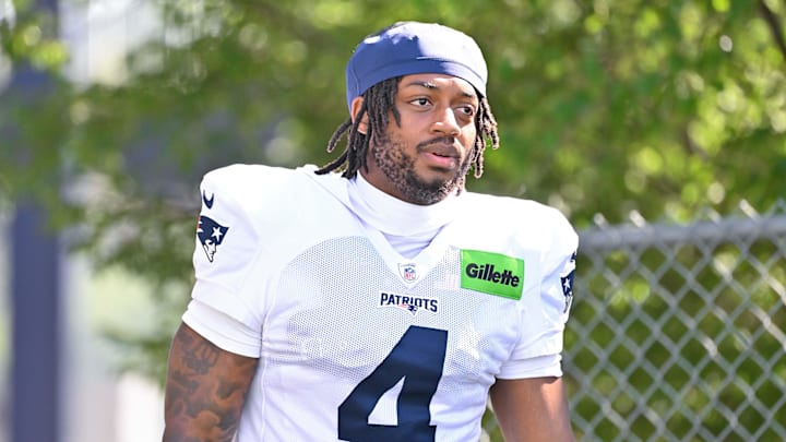 Jul 28, 2025; Foxborough, MA, USA; New England Patriots running back Antonio Gibson (4) heads to the practice fields for training camp at Gillette Stadium. Mandatory Credit: Eric Canha-Imagn Images