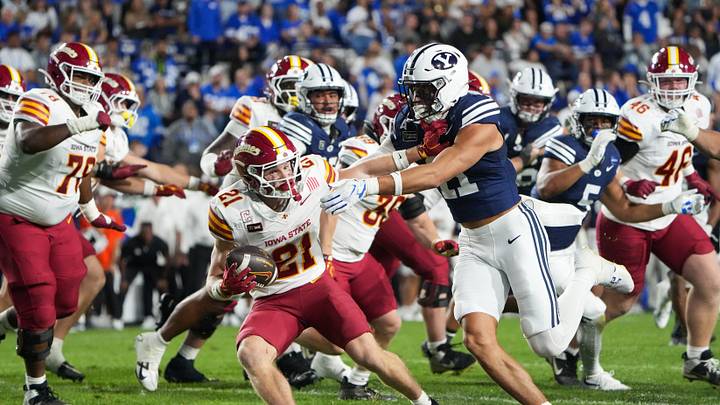 Oct 9, 2026; Provo, Utah, USA;  BYU Cougars safety Faletau Satuala (11) pulls down Iowa State Cyclones running back Aiden Flora (21) during the second half at LaVell Edwards Stadium.  Mandatory Credit: Aaron Baker-Imagn Images