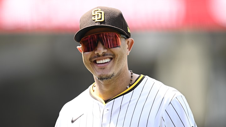 Aug 21, 2025; San Diego, California, USA; San Diego Padres third baseman Manny Machado (13) smiles as he leaves the field during the second inning against the San Francisco Giants at Petco Park. Mandatory Credit: Denis Poroy-Imagn Images Aug 21, 2025; San Diego, California, USA; San Diego Padres third baseman Manny Machado (13) smiles as he leaves the field during the second inning against the San Francisco Giants at Petco Park. Mandatory Credit: Denis Poroy-Imagn Images