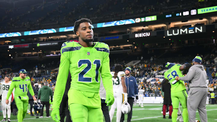 Dec 15, 2024; Seattle, Washington, USA; Seattle Seahawks cornerback Devon Witherspoon (21) walks off the field after the game against the Green Bay Packers at Lumen Field. Mandatory Credit: Steven Bisig-Imagn Images
