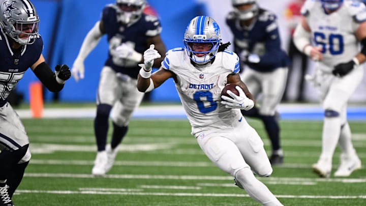 Dec 4, 2025; Detroit, Michigan, USA; Detroit Lions running back Jahmyr Gibbs (0) runs during the first half against the Dallas Cowboys at Ford Field. Mandatory Credit: Lon Horwedel-Imagn Images