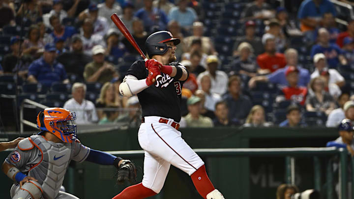 Sep 5, 2023; Washington, District of Columbia, USA; Washington Nationals left fielder Travis Blankenhorn (33) singles against the New York Mets during the second inning at Nationals Park. Mandatory Credit: Brad Mills-Imagn Images Sep 5, 2023; Washington, District of Columbia, USA; Washington Nationals left fielder Travis Blankenhorn (33) singles against the New York Mets during the second inning at Nationals Park. Mandatory Credit: Brad Mills-Imagn Images
