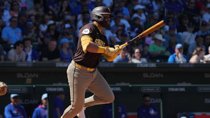 Mar 21, 2025; Mesa, Arizona, USA; San Diego Padres outfielder Tirso Ornelas (21) hits against the Chicago Cubs in the first inning at Sloan Park. 