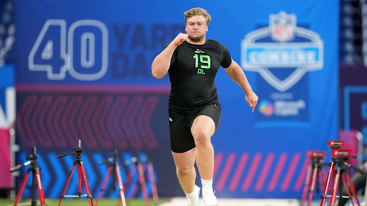 Mar 2, 2025; Indianapolis, IN, USA; Wisconsin offensive lineman Joe Huber (OL19) during the 2025 NFL Scouting Combine at Lucas Oil Stadium. Mandatory Credit: Kirby Lee-Imagn Images
