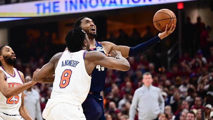 May 25, 2026; Cleveland, Ohio, USA; Cleveland Cavaliers guard Donovan Mitchell (45) shoots the ball while defended by New York Knicks forward OG Anunoby (8) in the third quarter during game four of the eastern conference finals for the 2026 NBA playoffs at Rocket Arena. Mandatory Credit: Ken Blaze-Imagn Images May 25, 2026; Cleveland, Ohio, USA; Cleveland Cavaliers guard Donovan Mitchell (45) shoots the ball while defended by New York Knicks forward OG Anunoby (8) in the third quarter during game four of the eastern conference finals for the 2026 NBA playoffs at Rocket Arena. Mandatory Credit: Ken Blaze-Imagn Images
