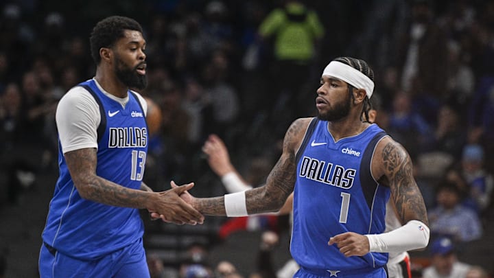 Jan 9, 2025; Dallas, Texas, USA; Dallas Mavericks guard Jaden Hardy (1) and forward Naji Marshall (13) celebrate during the second quarter against the Portland Trail Blazers at the American Airlines Center. Mandatory Credit: Jerome Miron-Imagn Images