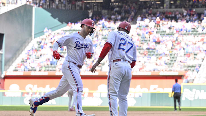 Apr 1, 2023; Arlington, Texas, USA; Texas Rangers catcher Mitch Garver (18) rounds third base past