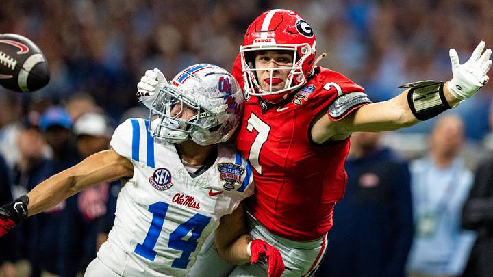 Georgia tight end Lawson Luckie (7) lunges for a pass as Ole Miss safety Kapena Gushiken (14) defends during the Sugar Bowl and College Football Playoff quarterfinals at Caesars Superdome in New Orleans, La., on Thursday, Jan. 1, 2026. Ole Miss defeated Georgia 39-34. Georgia tight end Lawson Luckie (7) lunges for a pass as Ole Miss safety Kapena Gushiken (14) defends during the Sugar Bowl and College Football Playoff quarterfinals at Caesars Superdome in New Orleans, La., on Thursday, Jan. 1, 2026. Ole Miss defeated Georgia 39-34.