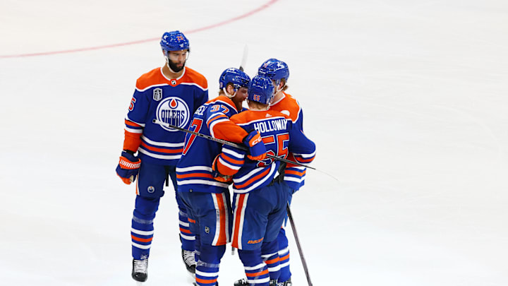 Jun 15, 2024; Edmonton, Alberta, CAN; Edmonton Oilers left wing Dylan Holloway (55) celebrates goal with teammates in the third period against the Florida Panthers  in game four of the 2024 Stanley Cup Final at Rogers Place. Mandatory Credit: Sergei Belski-USA TODAY Sports