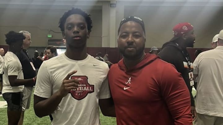 RJ Jones with Alabama DB coach Maurice Linguist. 