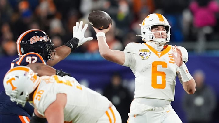 Tennessee quarterback Joey Aguilar (6) pulls back for the throw during the Music City Bowl NCAA college football game against Illinois on Dec. 30, 2025, in Nashville, Tennessee. Tennessee quarterback Joey Aguilar (6) pulls back for the throw during the Music City Bowl NCAA college football game against Illinois on Dec. 30, 2025, in Nashville, Tennessee.