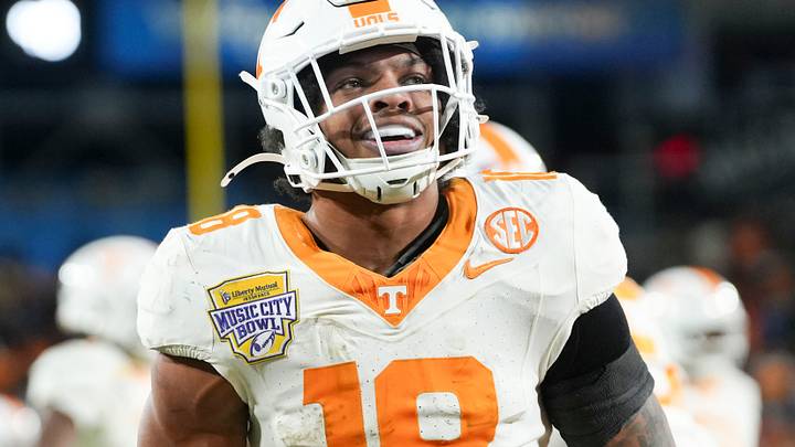 Tennessee running back DeSean Bishop (18) smiles in celebration after scoring a touchdown in the Music City Bowl NCAA college football game against Illinois on Dec. 30, 2025, in Nashville, Tennessee. Tennessee running back DeSean Bishop (18) smiles in celebration after scoring a touchdown in the Music City Bowl NCAA college football game against Illinois on Dec. 30, 2025, in Nashville, Tennessee.