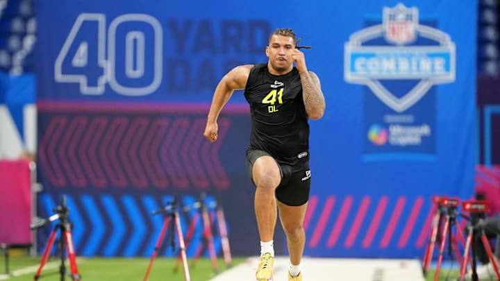 Feb 27, 2025; Indianapolis, IN, USA; Miami defensive lineman Tyler Baron (DL41) participates in drills during the 2025 NFL Combine at Lucas Oil Stadium. Mandatory Credit: Kirby Lee-Imagn Images