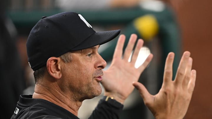 Aug 27, 2024; Washington, District of Columbia, USA; New York Yankees manager Aaron Boone (17) gestures in the dugout against the Washington Nationals during the fourth inning at Nationals Park. Mandatory Credit: Rafael Suanes-Imagn Images