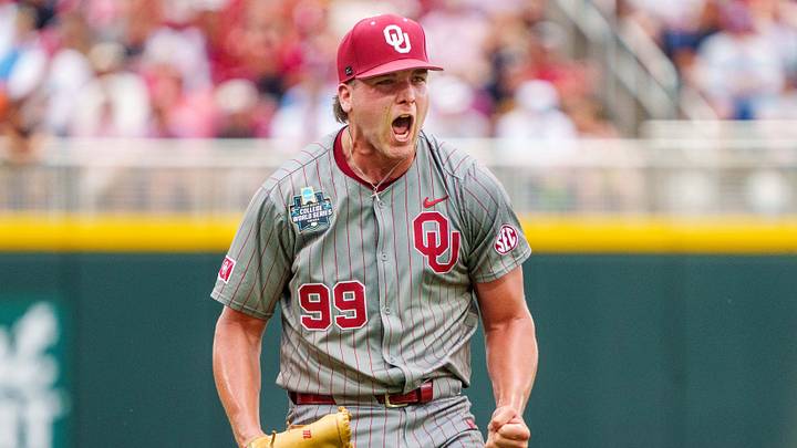 Jun 13, 2026; Omaha, NE, USA; Oklahoma Sooners starting pitcher Cord Rager (99) celebrates while walking off at the end of the seventh inning against the Alabama Crimson Tide at Charles Schwab Field. Mandatory Credit: Dylan Widger-Imagn Images Jun 13, 2026; Omaha, NE, USA; Oklahoma Sooners starting pitcher Cord Rager (99) celebrates while walking off at the end of the seventh inning against the Alabama Crimson Tide at Charles Schwab Field. Mandatory Credit: Dylan Widger-Imagn Images