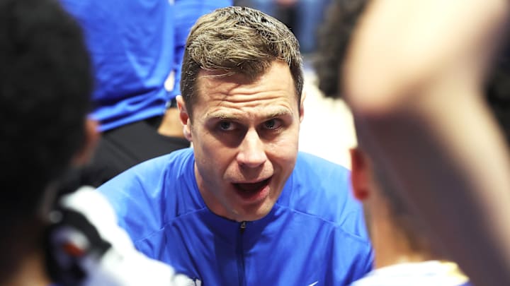 Feb 10, 2026; Pittsburgh, Pennsylvania, USA;  Duke Blue Devils head coach Jon Scheyer talks to his team in the huddle against the Pittsburgh Panthers during the first half at Petersen Events Center. Mandatory Credit: Charles LeClaire-Imagn Images
