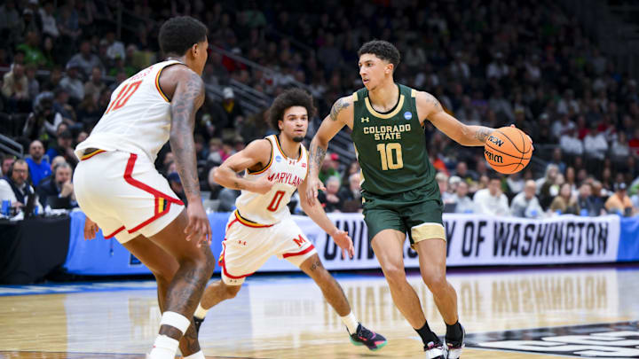 Mar 23, 2025; Seattle, WA, USA; Colorado State Rams guard Nique Clifford (10) dribbles the ball against Maryland Terrapins guard Ja'Kobi Gillespie (0) and forward Julian Reese (10) in the second half at Climate Pledge Arena. Mandatory Credit: Steven Bisig-Imagn Images