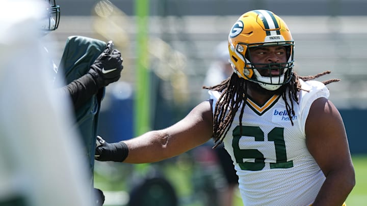 Green Bay Packers offensive lineman Lecitus Smith (61) is shown during organized team activities Wednesday, May 29, 2024 in Green Bay, Wisconsin. Green Bay Packers offensive lineman Lecitus Smith (61) is shown during organized team activities Wednesday, May 29, 2024 in Green Bay, Wisconsin.