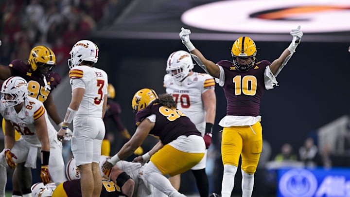 Dec 7, 2024; Arlington, TX, USA; Arizona State Sun Devils defensive lineman Clayton Smith (10) celebrates after defensive lineman Justin Wodtly (95) recovers a Iowa State Cyclones fumble during the second half at AT&T Stadium. Mandatory Credit: Jerome Miron-Imagn Images