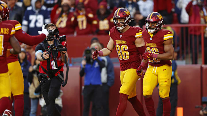 Nov 24, 2024; Landover, Maryland, USA; Washington Commanders tight end Zach Ertz (86) celebrates after scoring a touchdown during the fourth quarter against the Dallas Cowboys at Northwest Stadium. Mandatory Credit: Peter Casey-Imagn Images