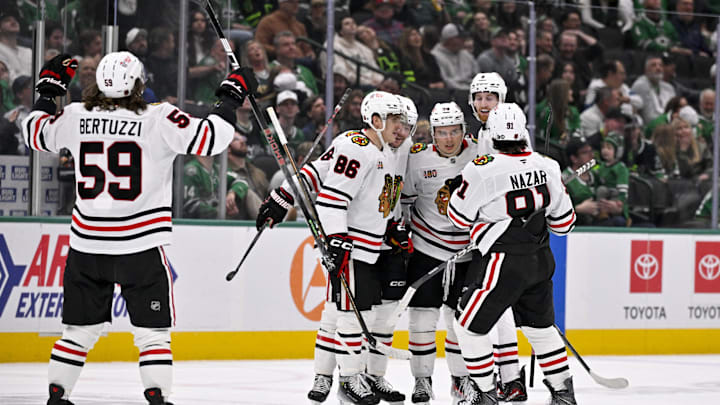 Mar 8, 2026; Dallas, Texas, USA; Chicago Blackhawks center Ryan Donato (8) and center Connor Bedard (98) and defenseman Sam Rinzel (6) and center Teuvo Teravainen (86) and left wing Tyler Bertuzzi (59) and center Frank Nazar (91) celebrate a goal during the game between the Stars and the Blackhawks at American Airlines Center. Mandatory Credit: Jerome Miron-Imagn Images