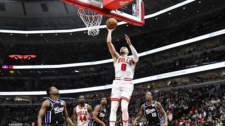Jan 12, 2025; Chicago, Illinois, USA;  Chicago Bulls guard Zach LaVine (8) shoots against the Sacramento Kings during the first half at United Center. Mandatory Credit: Matt Marton-Imagn Images