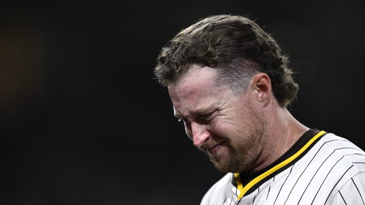 Jun 10, 2024; San Diego, California, USA; San Diego Padres second baseman Jake Cronenworth (9) reacts after being hit by a pitch during the seventh inning against the Oakland Athletics at Petco Park. Mandatory Credit: Orlando Ramirez-USA TODAY Sports