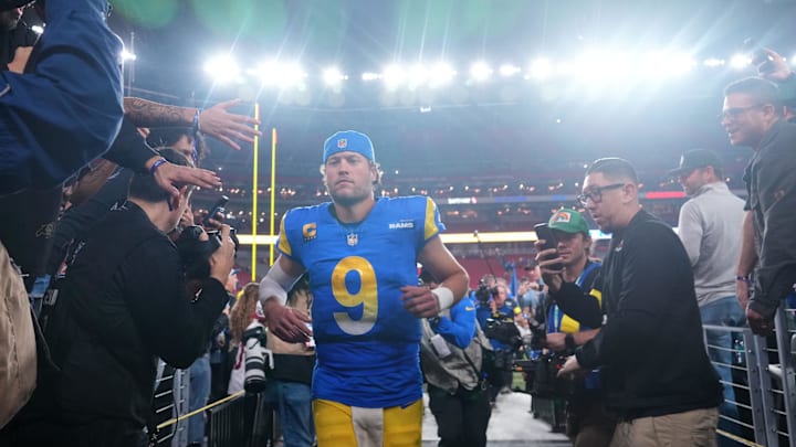 Jan 13, 2025; Glendale, AZ, USA; Los Angeles Rams quarterback Matthew Stafford (9) reacts after the NFC wild card game against the Minnesota Vikings at State Farm Stadium. Mandatory Credit: Joe Camporeale-Imagn Images