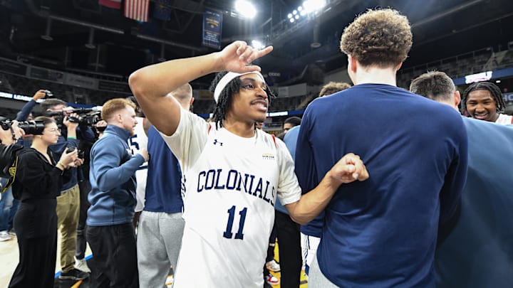 Mar 11, 2025; Indianapolis, IN, USA; Robert Morris Colonials guard DJ Smith (11) celebrates after defeating the Youngstown State Penguins to win the Horizon League Championship at Corteva Coliseum. Mandatory Credit: Robert Goddin-Imagn Images