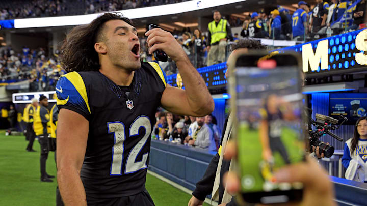 Nov 16, 2025; Inglewood, California, USA; Los Angeles Rams wide receiver Puka Nacua (12) takes a selfie video after beating the Seattle Seahawks at SoFi Stadium. Mandatory Credit: Jayne Kamin-Oncea-Imagn Images