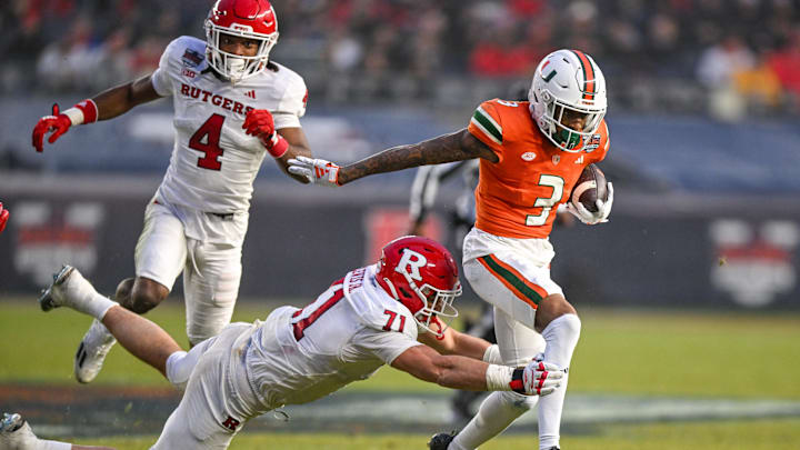 Dec 28, 2023; Bronx, NY, USA; Miami Hurricanes wide receiver Jacolby George (3) runs with the ball