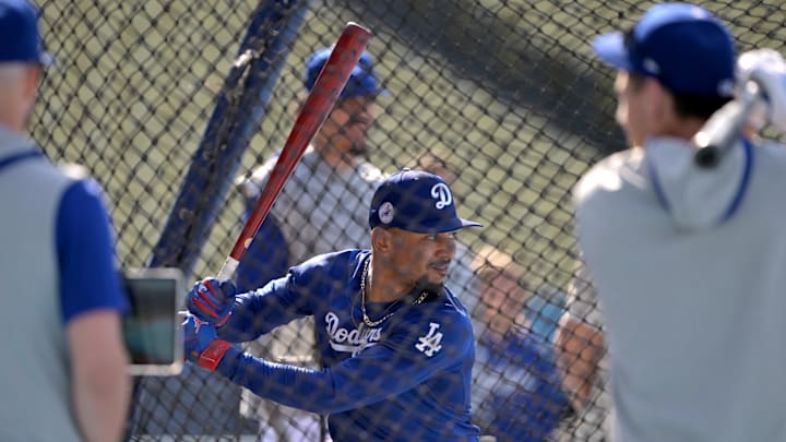 May 20, 2024; Los Angeles, California, USA;  Los Angeles Dodgers shortstop Mookie Betts (50) takes batting practice prior to the game against the Arizona Diamondbacks at Dodger Stadium. Mandatory Credit: Jayne Kamin-Oncea-Imagn Images