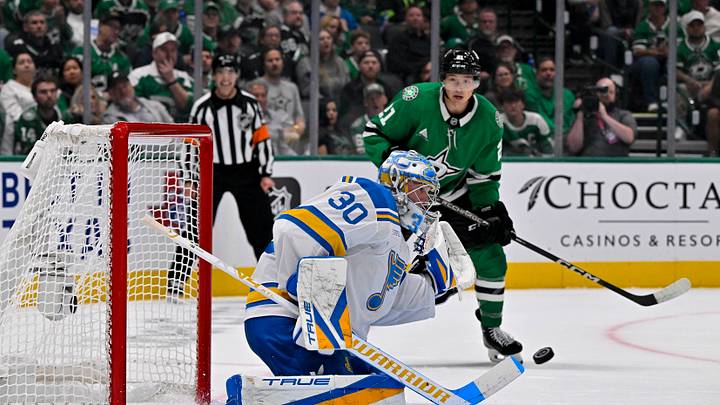 Oct 2, 2026; Dallas, Texas, USA; St. Louis Blues goaltender Joel Hofer (30) makes a stick save in front of Dallas Stars left wing Jason Robertson (21) during the second period at the American Airlines Center. Mandatory Credit: Jerome Miron-Imagn Images Oct 2, 2026; Dallas, Texas, USA; St. Louis Blues goaltender Joel Hofer (30) makes a stick save in front of Dallas Stars left wing Jason Robertson (21) during the second period at the American Airlines Center. Mandatory Credit: Jerome Miron-Imagn Images