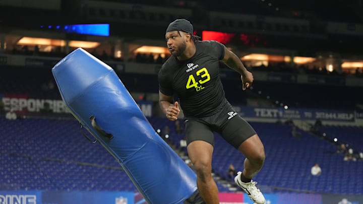 Oregon defensive lineman Jordan Burch goes through drills at the Scouting Combine. Oregon defensive lineman Jordan Burch goes through drills at the Scouting Combine.