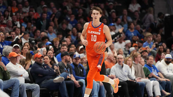 Mar 13, 2026; Charlotte, NC, USA; Clemson Tigers forward Jake Wahlin (10) brings the ball up the floor in the first half at Spectrum Center. Mandatory Credit: Bob Donnan-Imagn Images